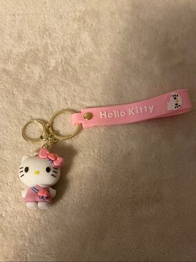 Hello Kitty Pink Silicone Wrist Strap Keychain with White Kitty Charm